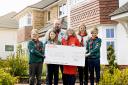 Cheque them out! Housebuilder launches £10,000 fund for community groups