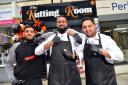 Barber Ilyas Mohammed and his team outside The Kutting Room