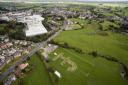 An aerial view of the world's largest pound symbol at Barton Laws Showfields, Wigton