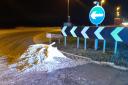 A lorry split on the A142 causing cockles to spill across the road.