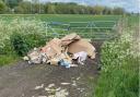 The fly-tip made up of cardboard boxes and packaging discovered on Fen Road in Milton