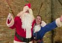 Santa and his elf at the Floods Tavern in St Ives.