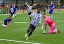 Enoch Andoh wheels away after putting St Ives Town 2-1 up against Chasetown in the FA Cup