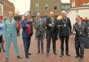 The mayors and chairs give their pancakes a flip ahead of the famous 'Chain Gang' race at the Huntingdon Pancake Flipathon.