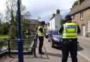 The County Council is also applying for Civil Parking Enforcement powers to allow them to enforce inconsiderate parking. Pictured: Police issuing parking tickets in St Neots.