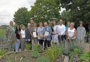 In Bloom judges and representatives from the town.