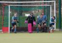 St Neots Men's 1s defending a Wisbech short corner.