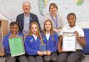 Pictured are pupils Junior, Ruby, Zori and Laucia with Steve Legg and Sarah Moyles, eco group leader and teacher.