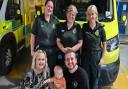 Paramedic Sarah-Jayne Parsons, Senior Emergency Medical Technician Bethany Walesby, and Emergency Care Assistant Amy Rengert with Christian and Jessica Roberts and baby Luca. 