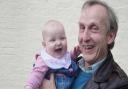 Dr Peter Williams pictured with his first granddaughter Ella 14 years ago.