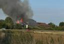 A fire has broken out at the old Burger King building at Fenstanton services.