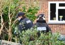 Cambridgeshire Police officers searched the grounds of Eliza Bibby's bungalow.