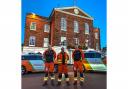 Huntingdon Town Hall bathed in orange light.