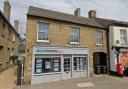 A village estate agents could become a wine bar and bookshop after new plans were submitted.