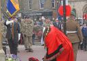 Karl Brockett laying a wreath at the war memorial in Huntingdon.