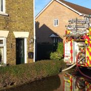 Emergency services pumping water out of a property in Gold Street, March, on Christmas Eve 2019.