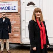 Ox-Cam Pathfinder Project\'s PFR business advisor, Matt Tandy, and residential advisor, Mary Dhonau OBE outside the Floodmobile.