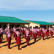 Students gather for school at the Hope Secondary School in Mangochi, Malawi.