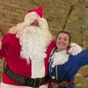 Santa and his elf at the Floods Tavern in St Ives.