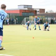 The Men's 1s going through a short corner routine, have been imperious in front of goal this season.