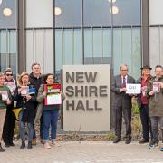 Members of People Opposing Woodhurst Incinerator gathered before the meeting in protest against the plans and presented a petition with 4237 signatures.