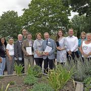 In Bloom judges and representatives from the town.