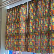 The curtains in the Priory Infant School hall are from the 1980s.