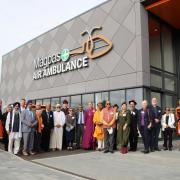 The faith leaders out the Magpas building.