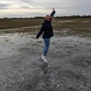 Laura De Stefano skating on the ice at Portholme Meadow in Huntingdonshire.