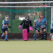 St Neots Men's 1s defending a Wisbech short corner.