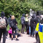 Animal rights activists protested outside MBR Acres in Sawtry Way in Wyton near Huntingdon on June 9.