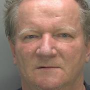 Andrzej Kopysc has been jailed for stalking his ex-partner and throwing a knife at her in Cambridge.