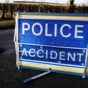 The A1307 Cambridge Road near Fenstanton is blocked following a crash between a tractor and a motorhome. 