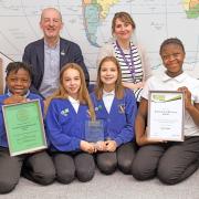 Pictured are pupils Junior, Ruby, Zori and Laucia with Steve Legg and Sarah Moyles, eco group leader and teacher.