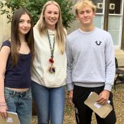 Mrs King (Head of Year - centre) pictured with top performers Raffi Millington (left) and Harry Prince (right).