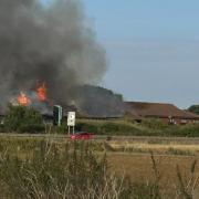 A fire has broken out at the old Burger King building at Fenstanton services.