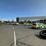 Officers found the lorry in Alconbury Weald with 12 people inside.