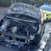 The aftermath of the car fire in Houghton Road, St Ives, on September 14.