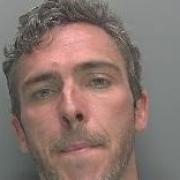 Shoplifter Scott Reynolds has been banned from stores in Cambridgeshire for five years.