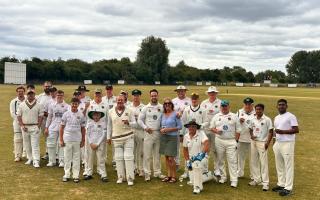 Both teams are pictured at the Eaton Socon ground.