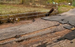 Parts of the road's surface have been left completely exposed.