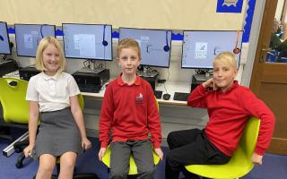 Pupils enjoying their new ICT suite at Earith Primary School.