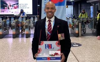 Huntingdon MP Ben Obese-Jecty collecting for the Royal British Legion's Poppy Appeal.