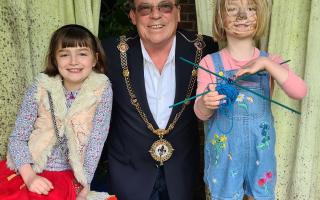 Cllr Alan Hooker with Ariadne and Isadora Vane, the granddaughters of Christopher Vane Percy, at Island Hall.