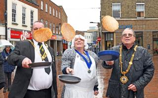 Cllr Karl Brockett, Cllr Julie Brockett and Cllr Alan Hooker practicing their flipping skills.